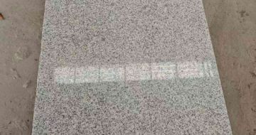 邵阳芝麻白光面毛板