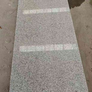 邵阳芝麻白光面毛板