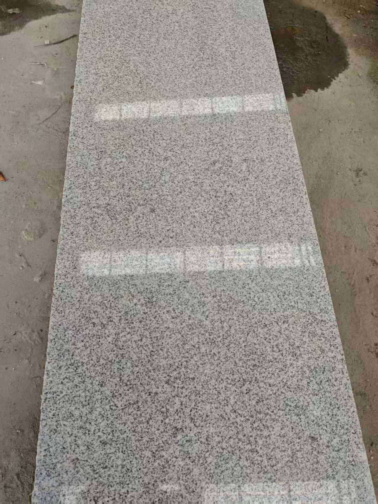 邵阳芝麻白光面毛板